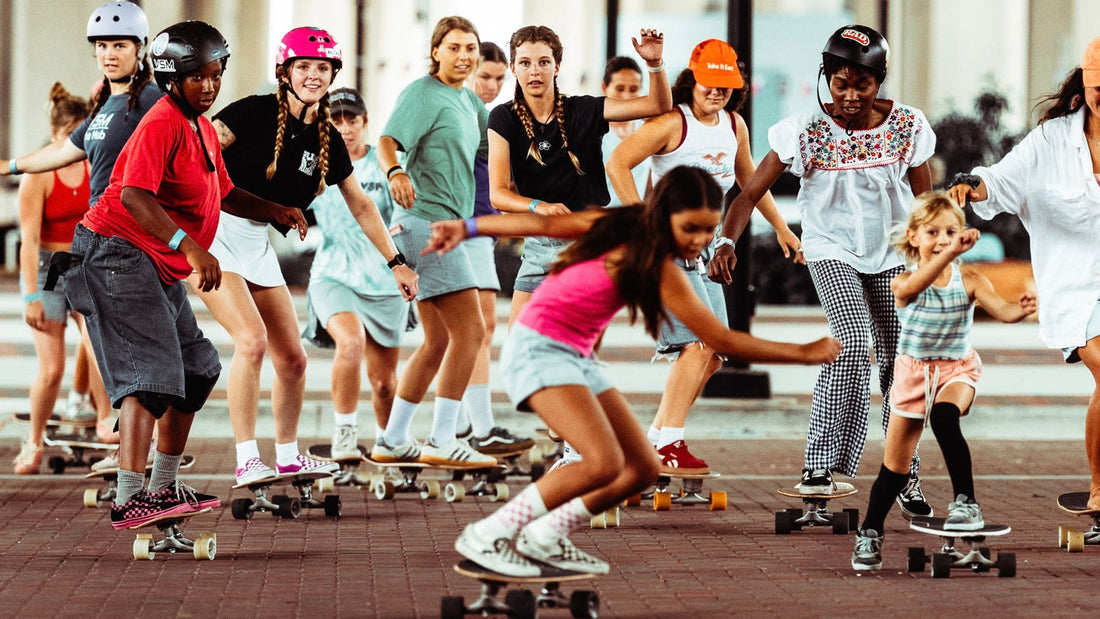Group of women and girls longboarding together in downtown Jacksonville, Marloru Riverside Skate Park event June 2026