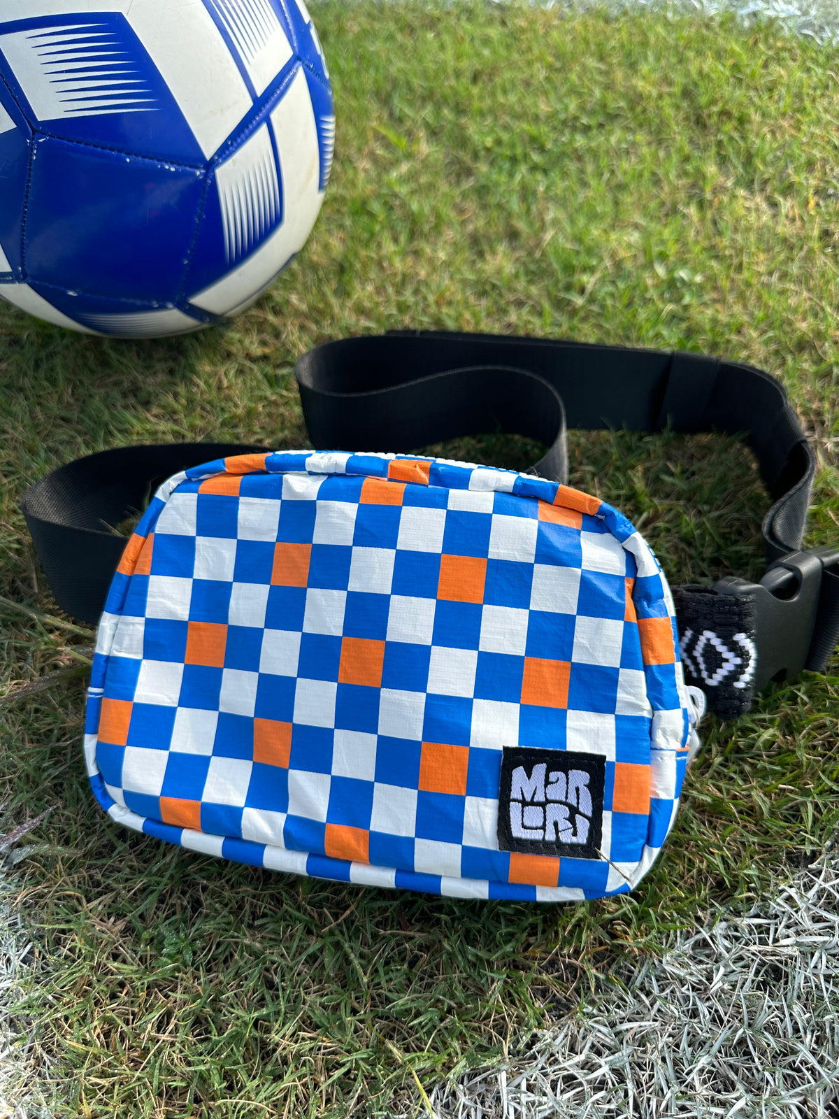 Block Party (Blue) Essentials Sling by Marloru, a checkered, water-resistant crossbody belt bag