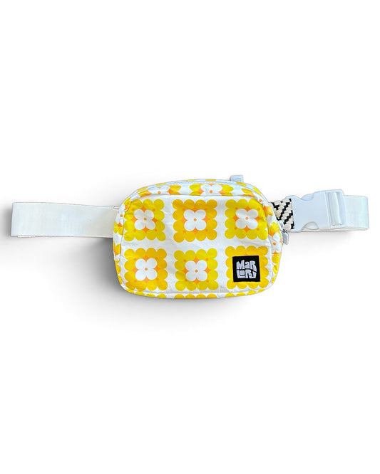 Crochet All Day Essentials Sling by Marloru, a crochet-print crossbody belt bag shown on white