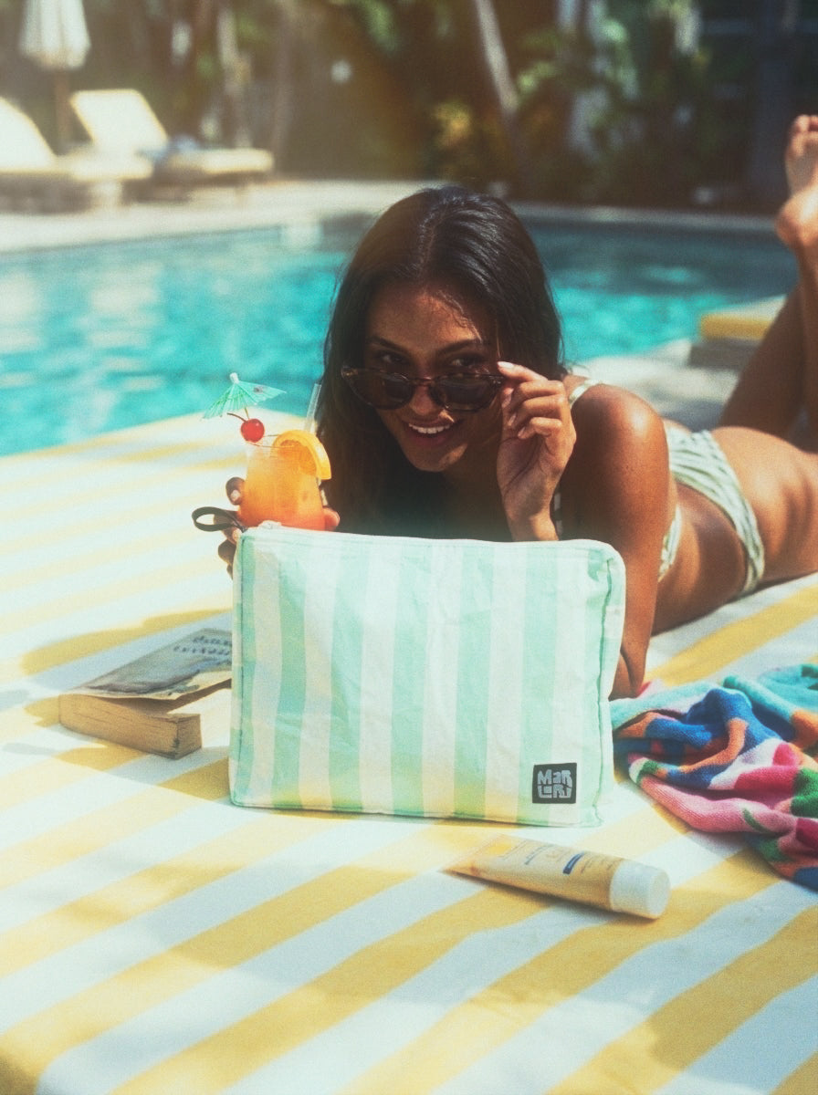 Seafoam Cabana Mid Pouch by Marloru, a wipe-clean zip pouch that fits in the Sunday Bag