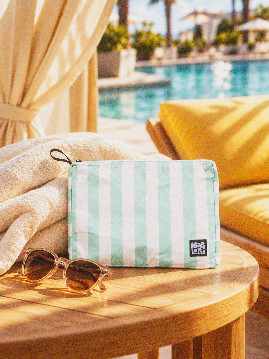 Seafoam Cabana Mid Pouch by Marloru, a water-resistant travel and toiletry pouch
